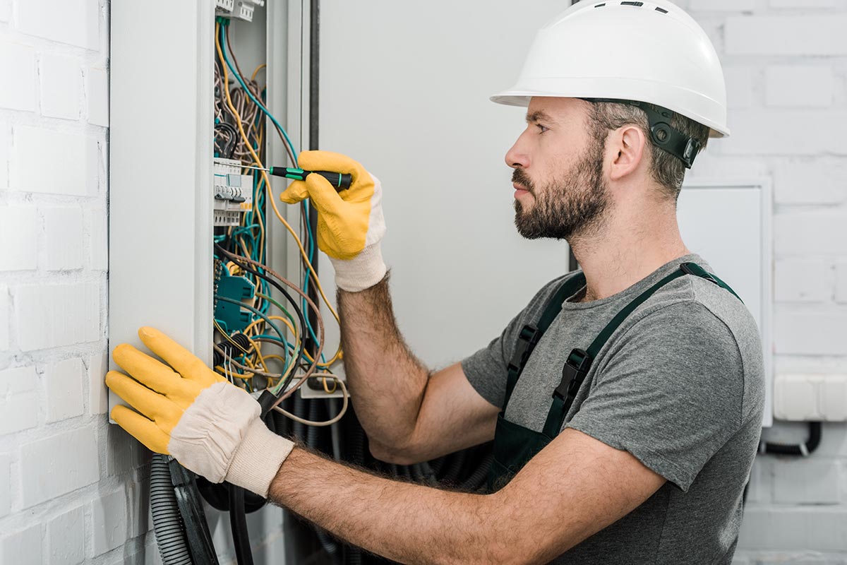 side-view-of-handsome-bearded-electrician-repairin-resize.jpg side-view-of-handsome-bearded-electrician-repairin-resize.jpg